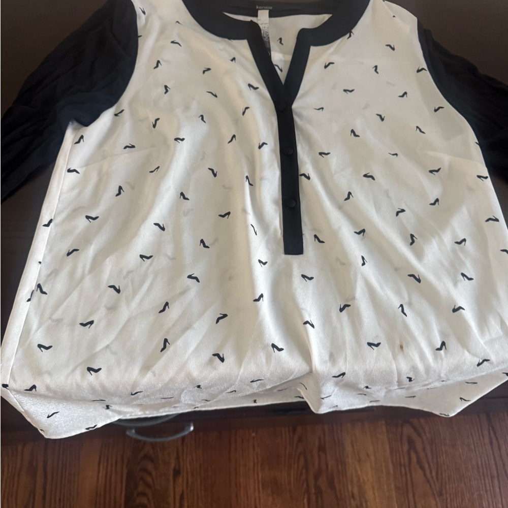 Black and White Blouse with Button Detail and high heel pattern